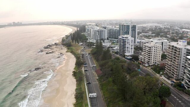 Hotel Buildings And Roads At The Sandy Coastline Of Mooloolaba Beach In QLD, Australia. aerial