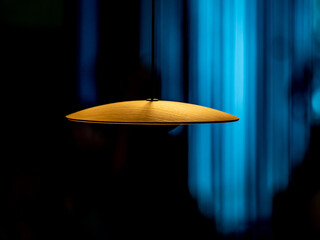 Lamp shade made of copper on a blue background