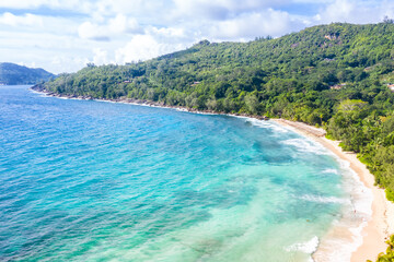 Seychelles Takamaka beach Mahe island vacation sea ocean palms drone view aerial photo