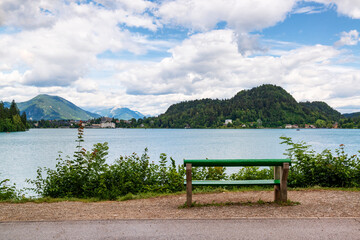 Naklejka na ściany i meble Bench with beautiful view on Bled lake