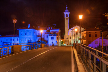 Bridge in night Kanal town in Slovenia