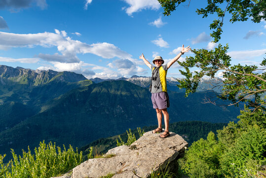 Happy traveller in the mountains