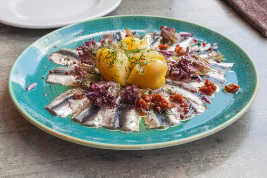 Baltic sprat, fillet. Traditional appetizer on the Baltic Sea. Service at a local restaurant