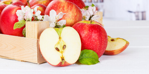 Apples fruits red apple fruit in a box with leaves panorama