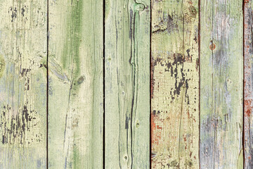 Fototapeta na wymiar The texture of the old blue wooden fence. Space for text. Background.