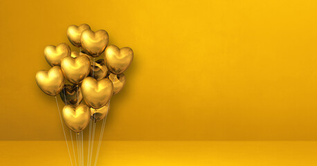 Gold heart shape balloons bunch on a yellow wall background. Horizontal banner.