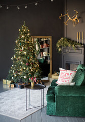 Dark Christmas interior with Christmas tree