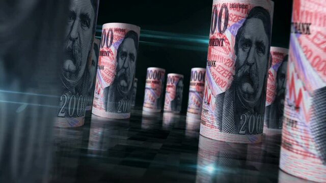 Hungarian Forint rolls loop 3d animation. Money on the table. Seamless and loopable abstract concept of economy, finance, business, recession and debt in Hungary. Camera between HUF rolled banknotes.