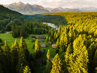 Traditional Wooden Log Cabins at Old Shepherd Hut Village in Jurgow, Podhale in Poland