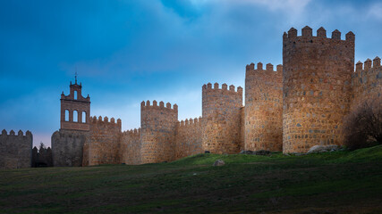 Medieval city wall built in the Romanesque style, Avila in Spain