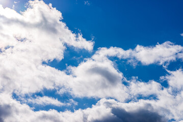 White fluffy clouds in the blue sky background.Cloudy white blue sky in the nice blue heaven sky.