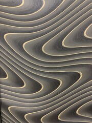 Old gray wall with curved lines texture structure as background