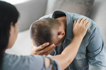 Female Psychologist, friend or family sitting and put hands on the shoulder for cheer up to mental...