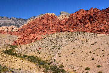the  colorful, eroded rocks of red rock national conservation area on a sunny day  in the mojave desert, near las vegas, nevada