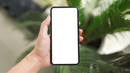 Cropped shot view of Women's hands holding cell telephone blank copy space screen. smart phone with technology concept.