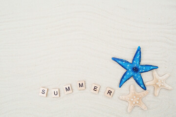 The concept of recreation at the resort. Sea stars, a rope and the inscription 