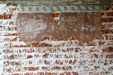 the remains of the painting of the walls of the temple