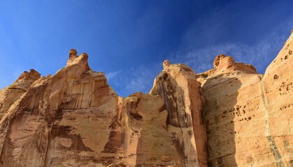  steep cliffs above the head of sinbad native american pictographs  on a sunny day in the san rafael swell near green river,  utah