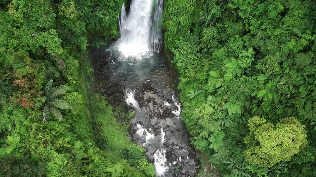 Aerial footage of Curug Gomblang (Gomblang Waterfall) located in Baseh, Kedungbanteng, Banyumas Regency, Central Java, Indonesia.