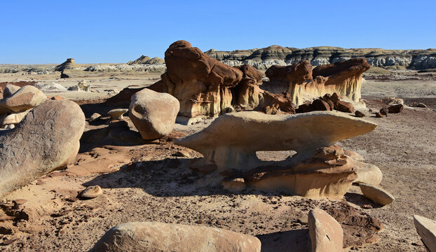 the natural  bisti arch on a sunny winter day in the alamo wash section of the bisti badlands near farmington, new mexico