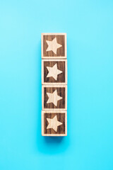 star symbol block on blue background. Service rating, ranking, customer review, satisfaction, evaluation and feedback concept