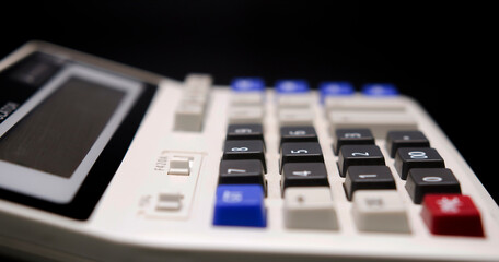 Obraz premium classic financial calculator Savings, finances, and economy concept.