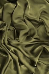 Smooth elegant silk or satin texture can use as abstract background. Luxurious background design