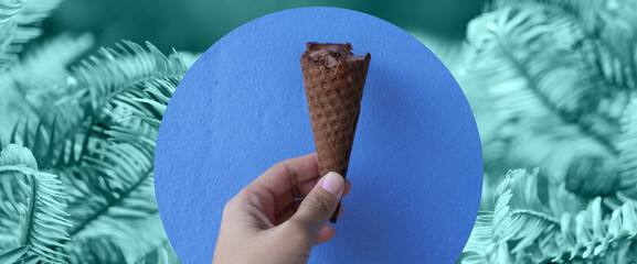 bright blue green fern leave and ice cream in hand summer banner background