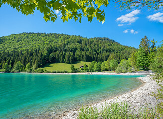beautiful bathing cove Niedernach, lake Walchensee, spring landscape bavaria