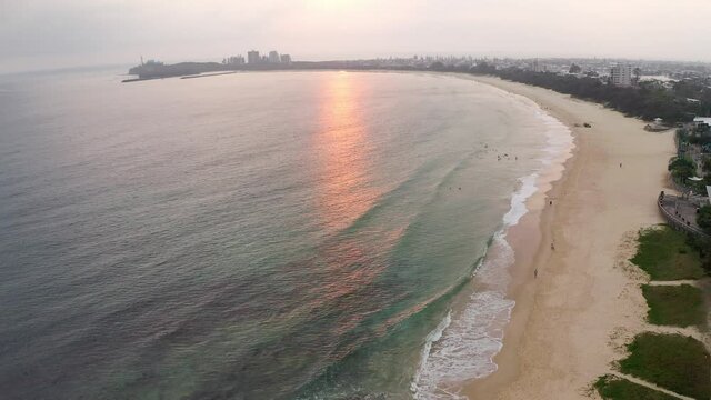 Aerial View of Beautiful Mooloolaba Beach in Queensland, Australia at Sunset. Port Cartwright Beach and Lighthouse at the Background.