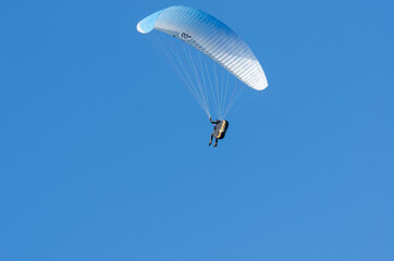 PARAGLIDING ON A SUNNY DAY