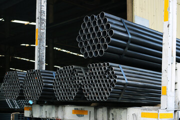 Steel round pipe packaging on truck for logistics process.