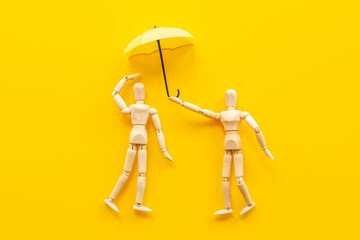 Two wooden figure connection - emotional communication concept