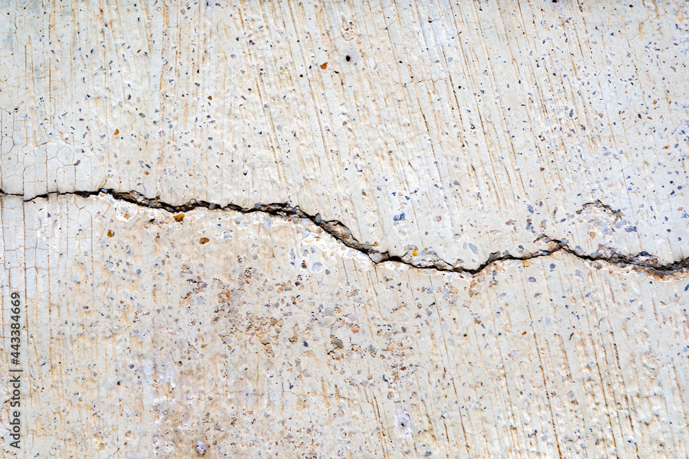 Wall mural Old plaster wall crack surface for texture