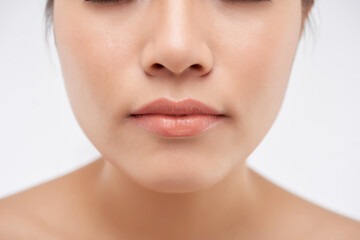 Obraz premium Close-up image of young un woman with beautiful flawless skin