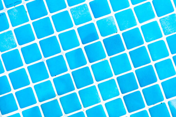 Blue small tiles at a swimming pool