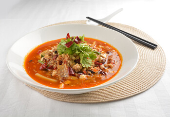 stir fried mapo tofu bean curd in spicy mala chilli sauce in white plate asian halal menu