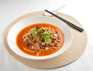 stir fried mapo tofu bean curd in spicy mala chilli sauce in white plate asian halal menu
