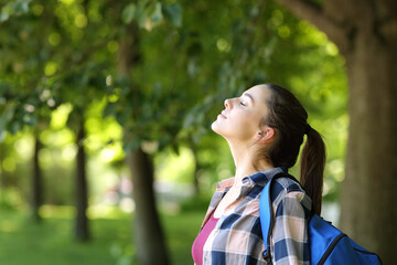 Student breathing fresh air in a campus or park