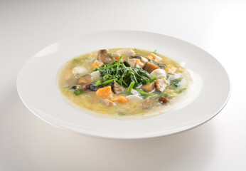 stir fried water spinach vegetable with trio eggs in thick gravy sauce in white plate asian halal menu
