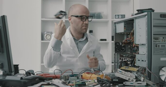 Careless technician repairing a computer