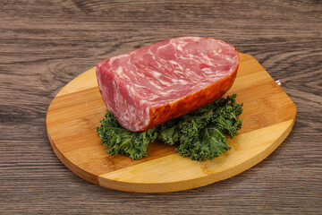 Beef ham piece over board