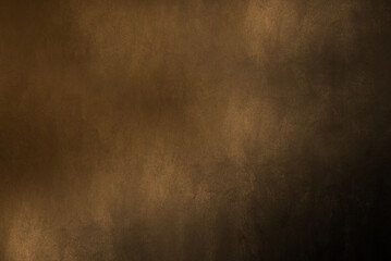 The rough surface of the wall is dark yellow