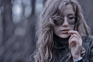 romantic autumn portrait of model, woman, in the autumn seasonal look outside, weather autumn