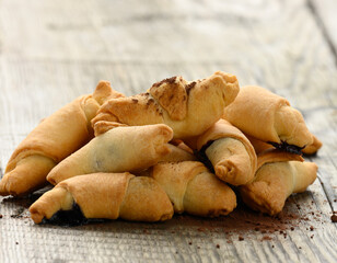 baked bagels on a gray wooden table, delicious pastries