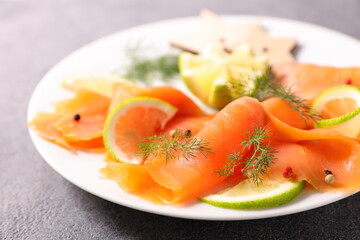 slice of smoked salmon and lemon