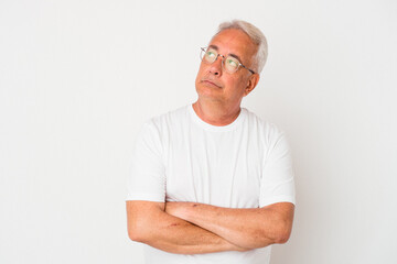 Senior american man isolated on white background tired of a repetitive task.