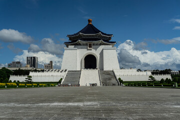 Chiang Kai Shek Memorial Hall in Taipei, Taiwan. The beautiful white building has an octogonal blue roof because number 8 is considered lucky in chinese culture.