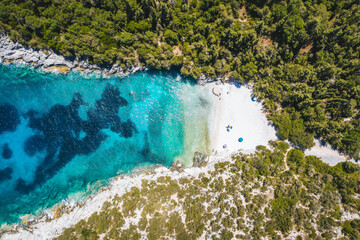Aerial top down view of remote Dafnoudi beach in Kefalonia, Greece. Secluded bay with pure crystal...