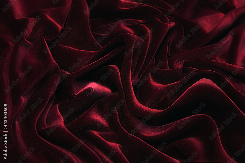 Wall mural Luxurious velvet fabric in red. Background and pattern.